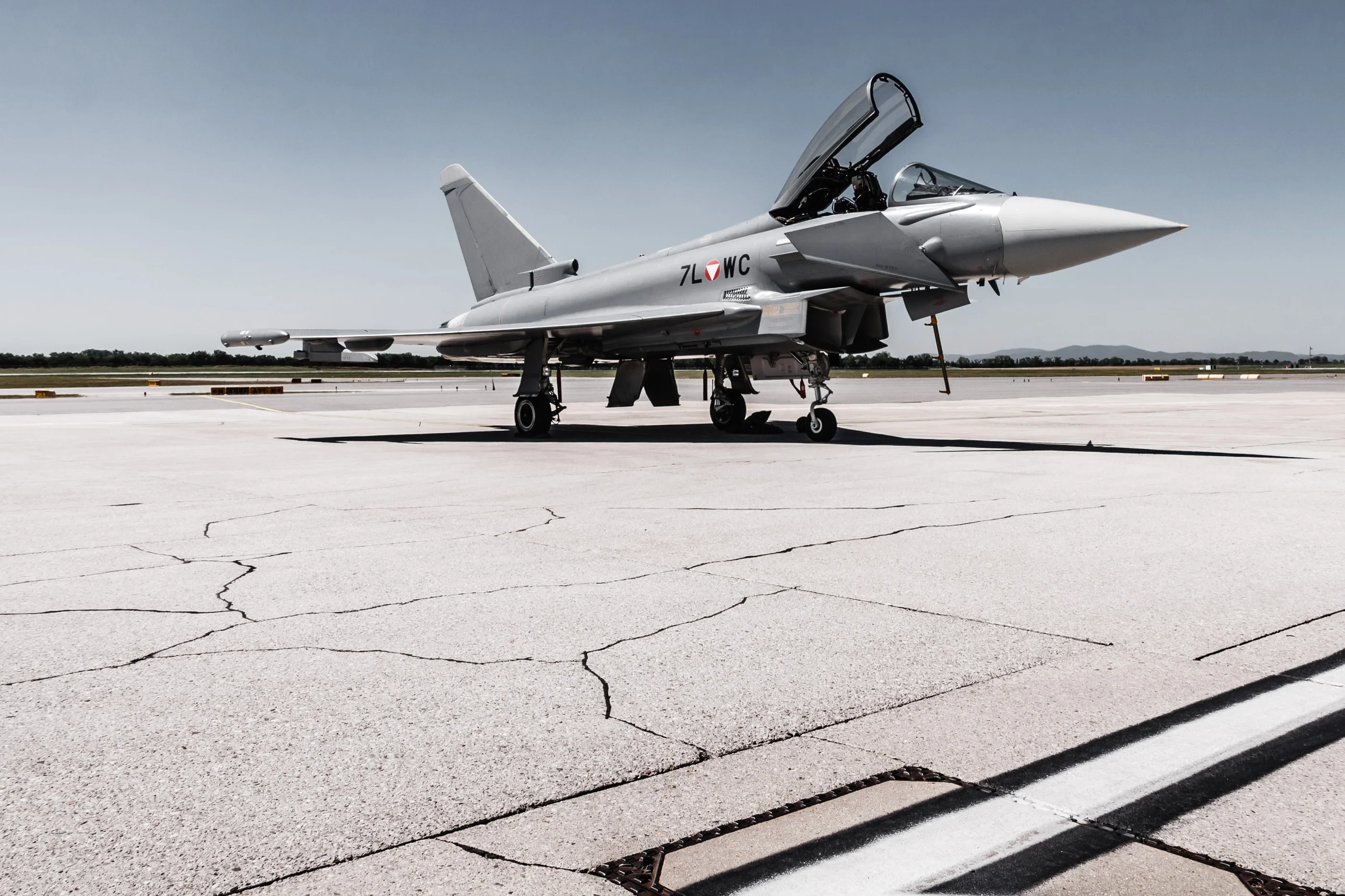 Eurofighter on cracked concrete with the canopy raised