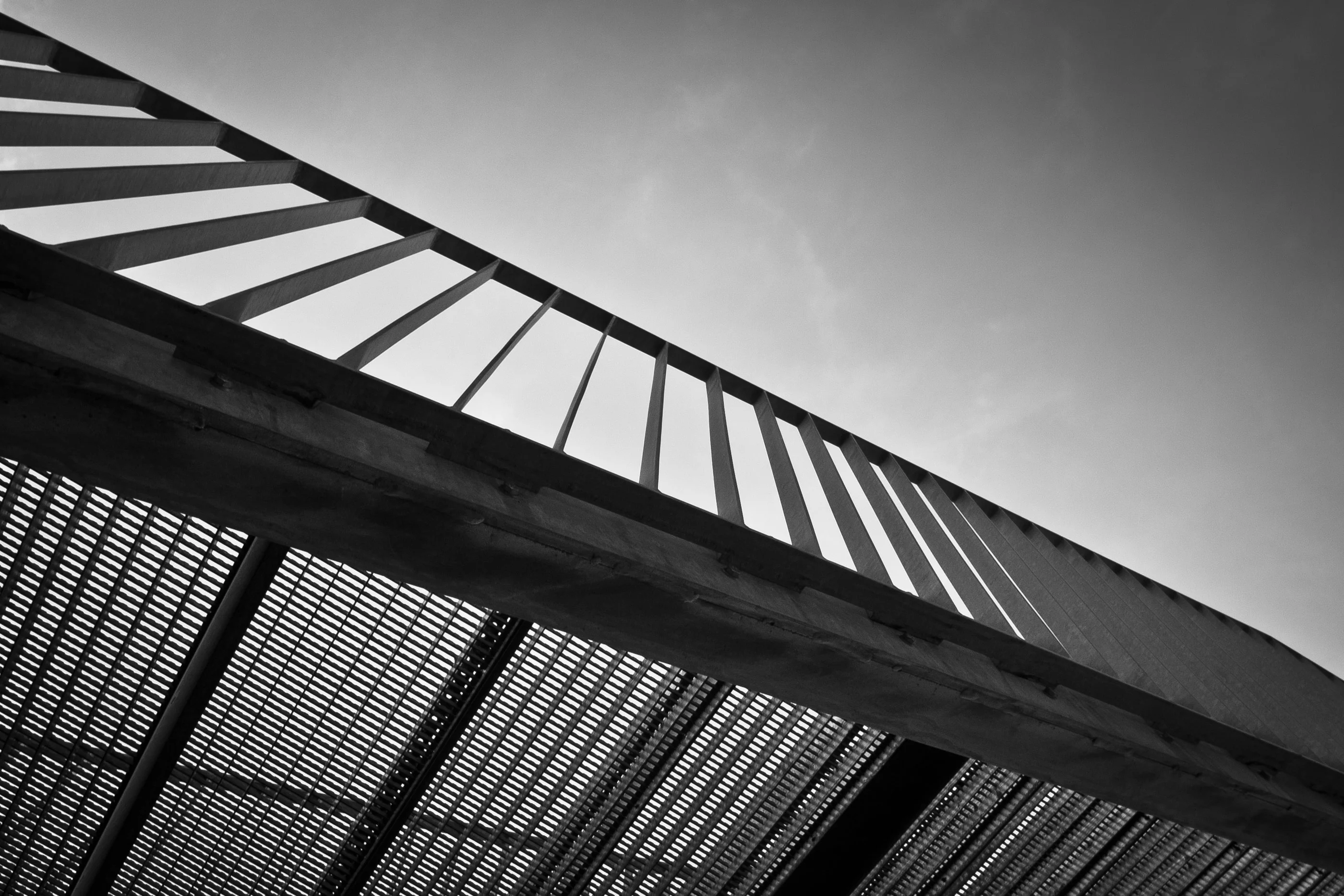 Diagonal steel louvres of a facade seen from below